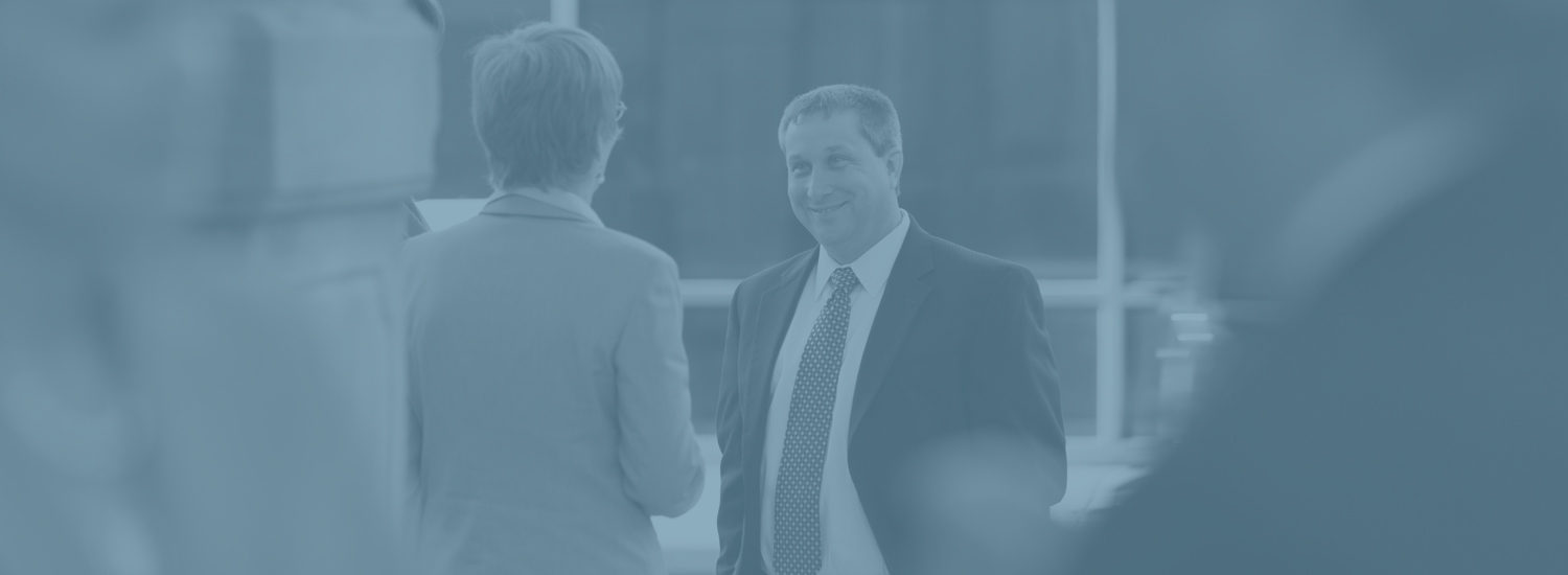 Lawyers enjoying conversation outside the firm offices