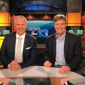 McGuire Wood & Bissette Attorney and Mercy Ugernt Care Board Member, John Fleming with Mark Keady WLOS Host of Spotlight Carolina