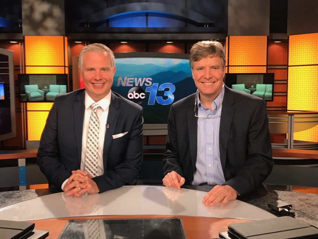 McGuire Wood & Bissette Attorney and Mercy Ugernt Care Board Member, John Fleming with Mark Keady WLOS Host of Spotlight Carolina
